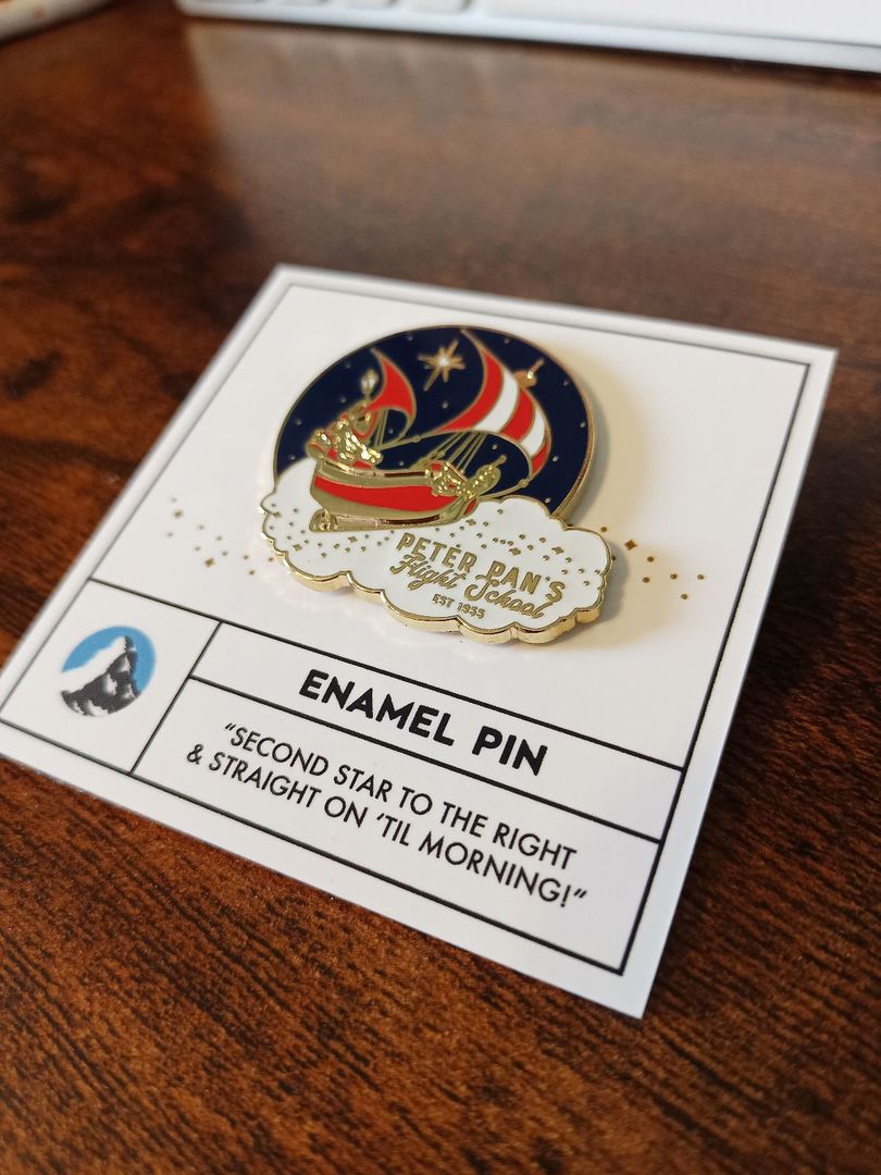 Custom firefighter enamel lapel pin with department logo and maltese cross design