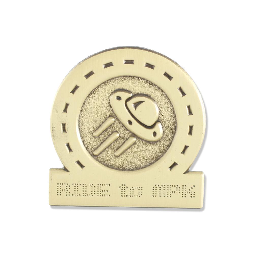 Custom diestruck antique gold plated lapel pin with UFO logo and biker pin text